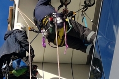 Soffit installation using rope access